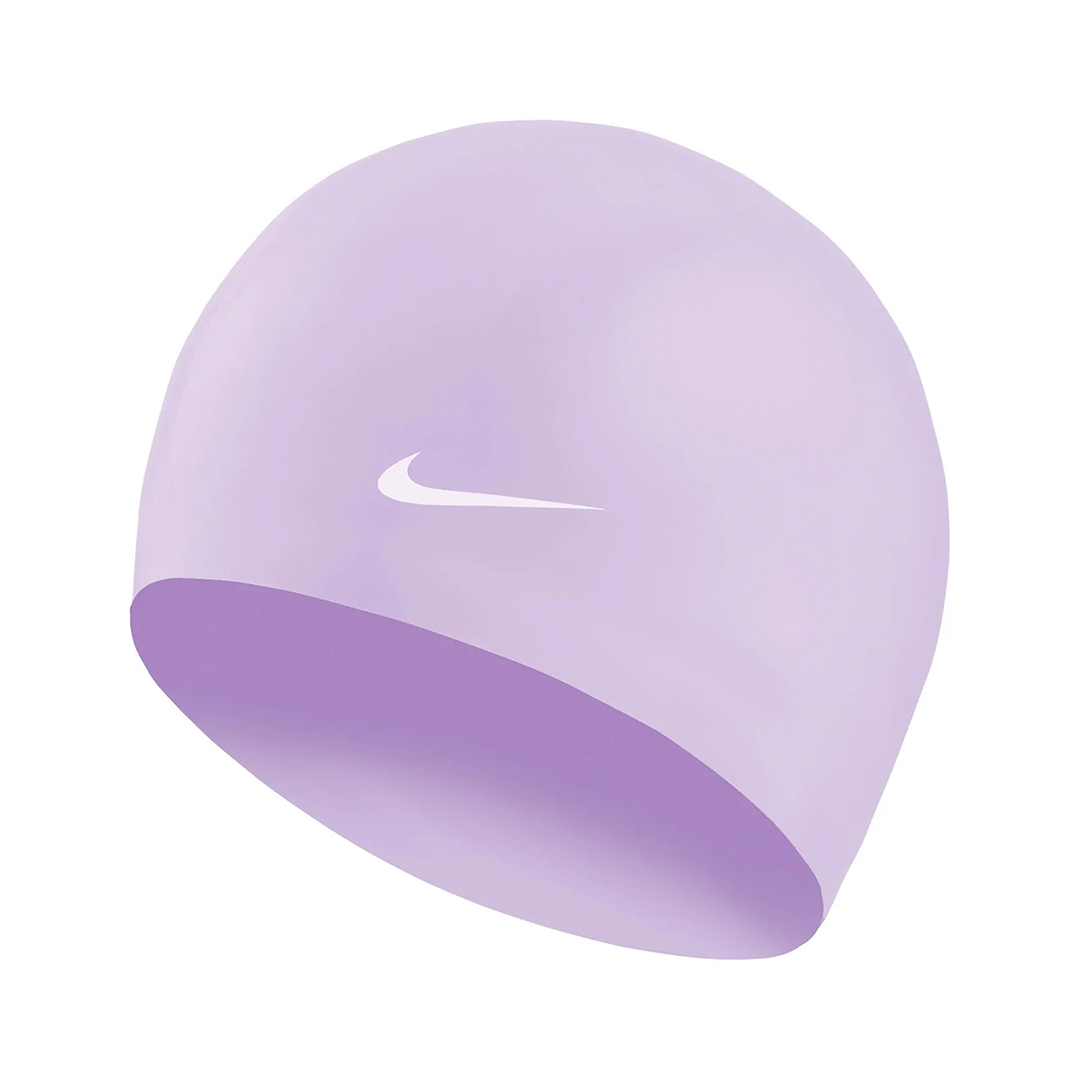 Purple swim cap with Nike logo on a white background