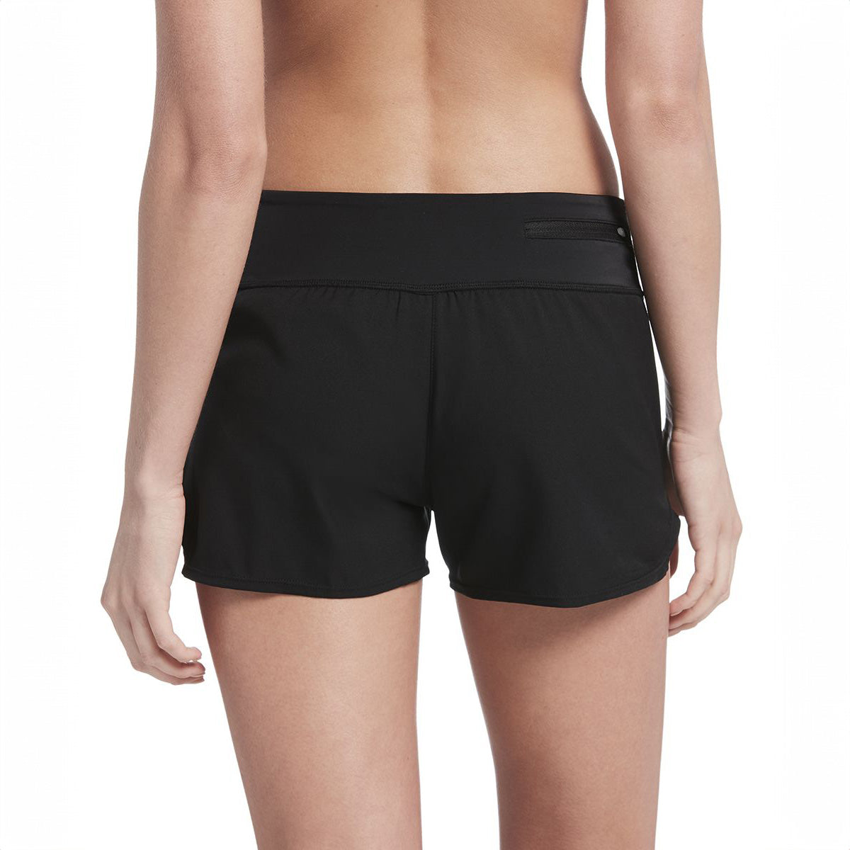 Black athletic shorts worn by a person on a white background
